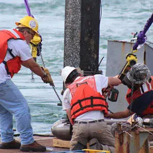 people working on turbine installation